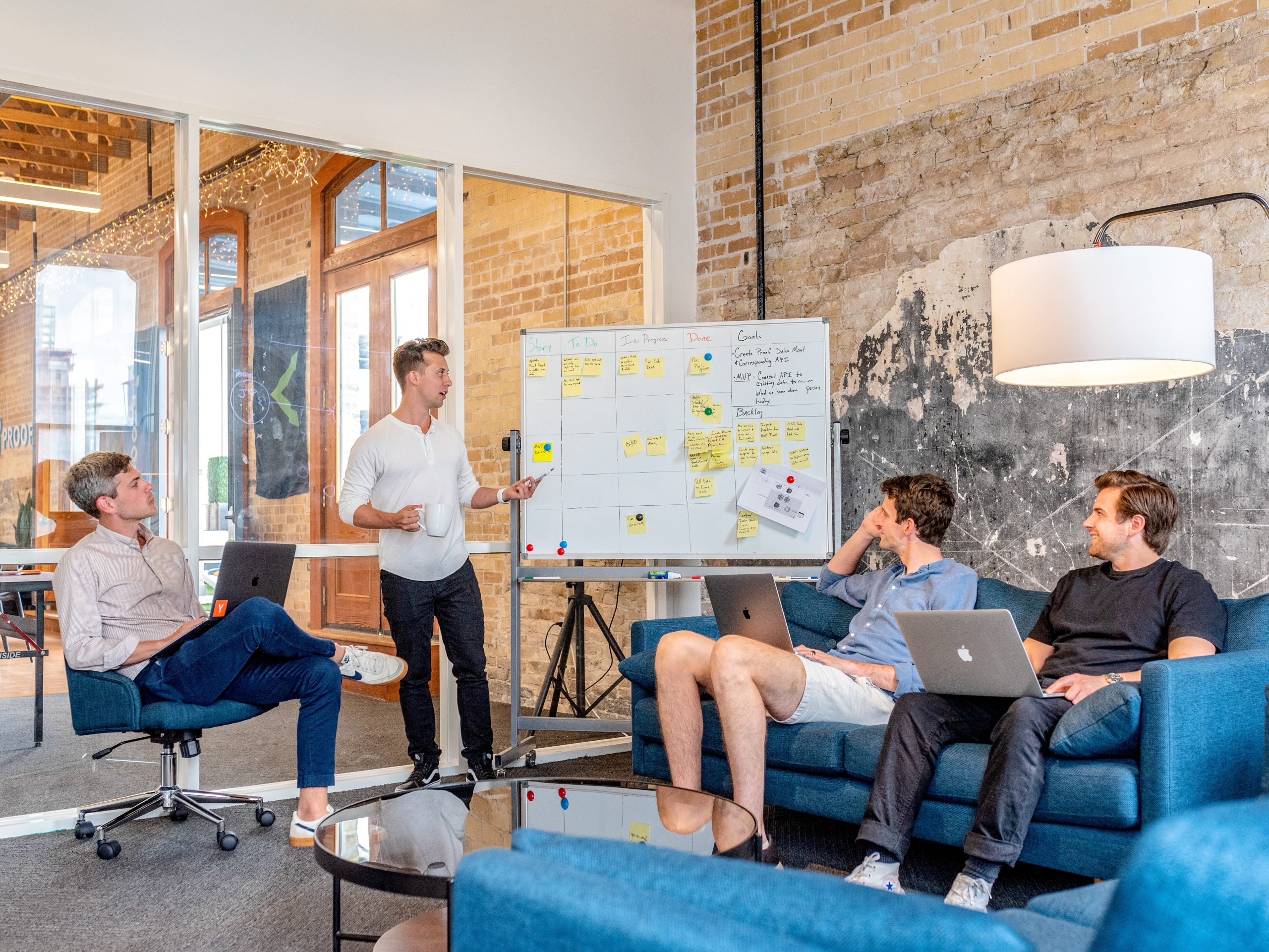 A happy team working on a task at an office